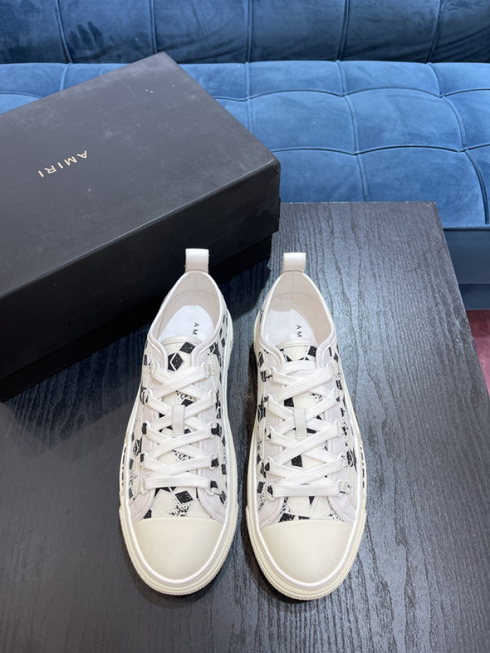 amiri* appliquéd leather and canvas sneakers